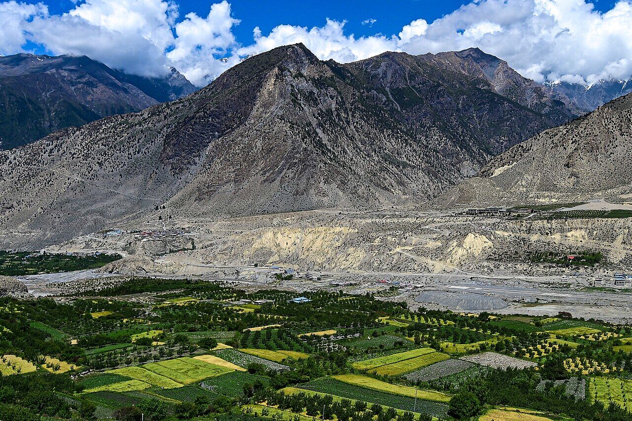 Green fields and barren hills in the Kali Gandaki valley, Mustang